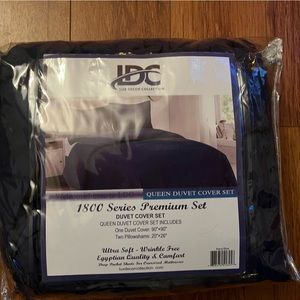 Duvet cover set. Opened but never used.  Queen size. Navy blue.